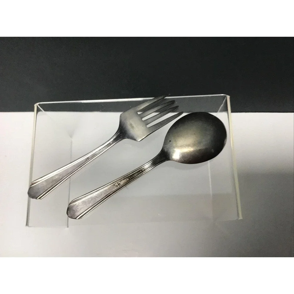 Vintage W.M. Rogers silver plate baby fork and spoon set.